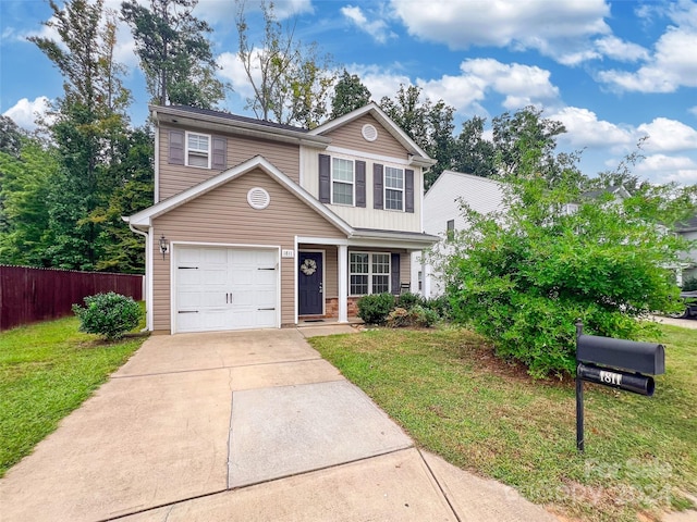 view of front of home with a garage and a front lawn