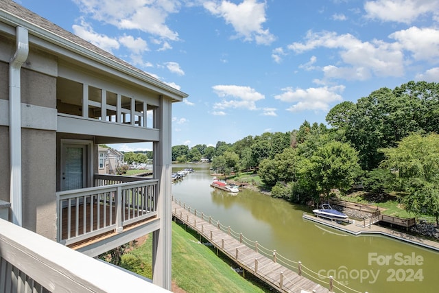 balcony featuring a water view