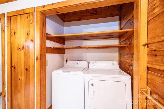 laundry room with separate washer and dryer