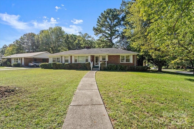 ranch-style house with a front lawn