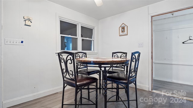 dining room with hardwood / wood-style flooring