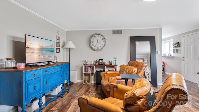 living room with crown molding and dark hardwood / wood-style flooring