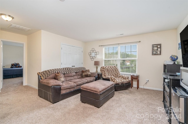 living room with light colored carpet