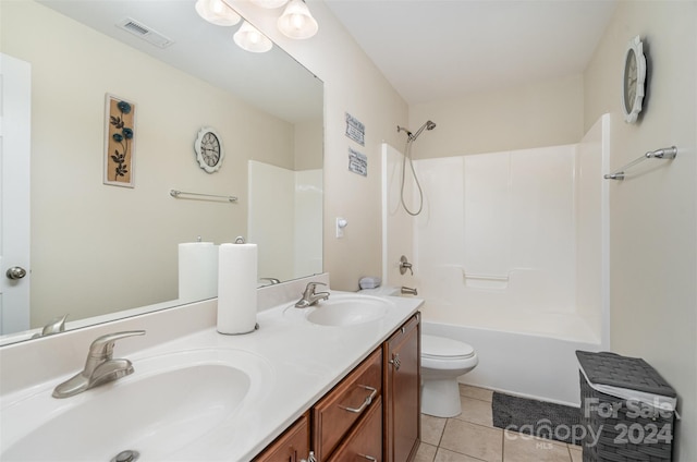 full bathroom with tile patterned floors, shower / bathtub combination, vanity, and toilet