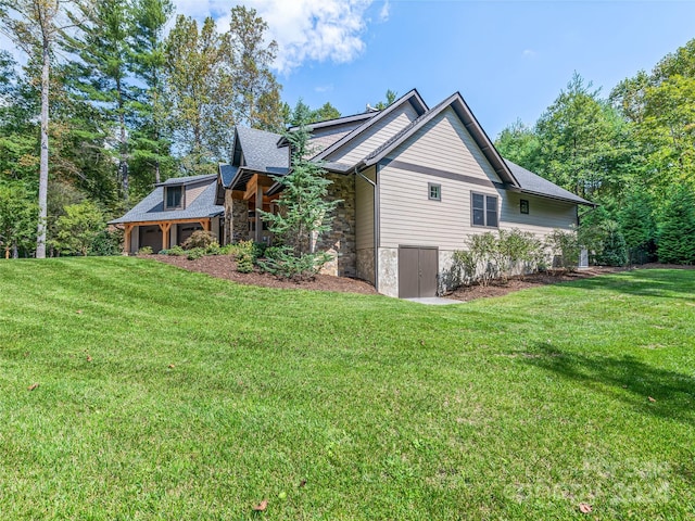 view of home's exterior featuring a lawn