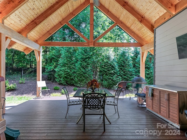 wooden terrace with area for grilling