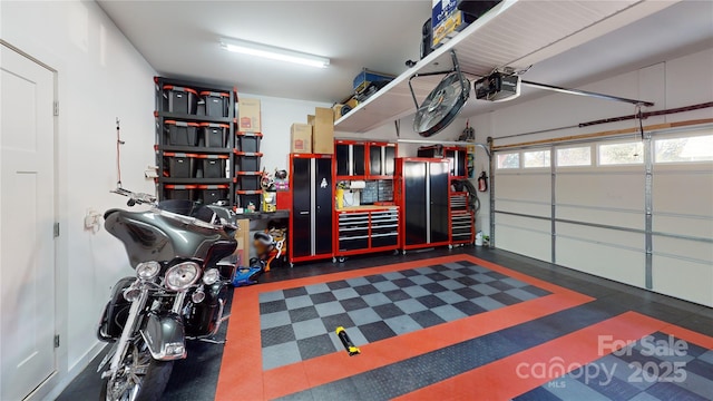 garage featuring a garage door opener