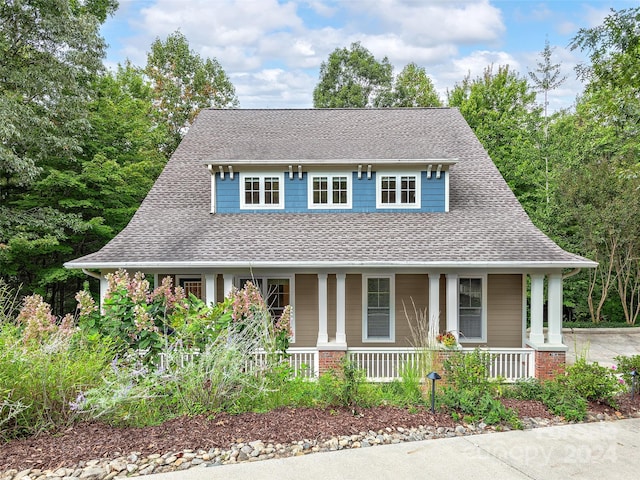 view of front of property featuring covered porch