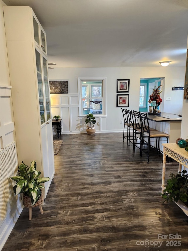 interior space featuring dark wood finished floors