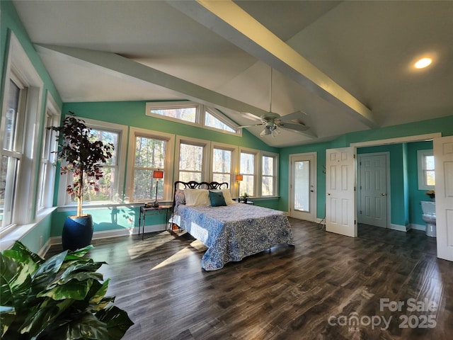 unfurnished bedroom with lofted ceiling with beams, ensuite bathroom, dark wood finished floors, and baseboards