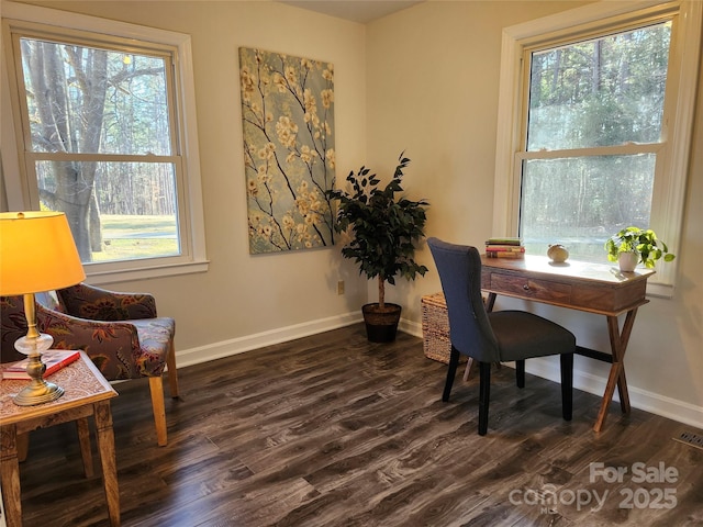 office featuring dark wood-style floors, visible vents, and baseboards