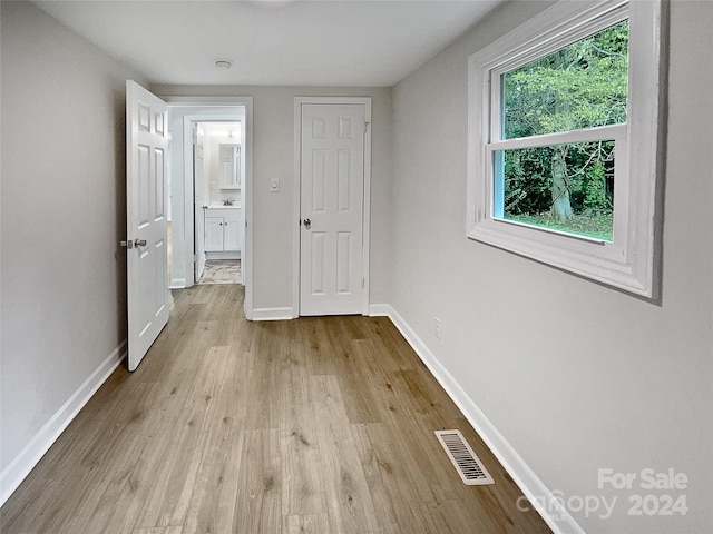 unfurnished bedroom featuring light hardwood / wood-style floors