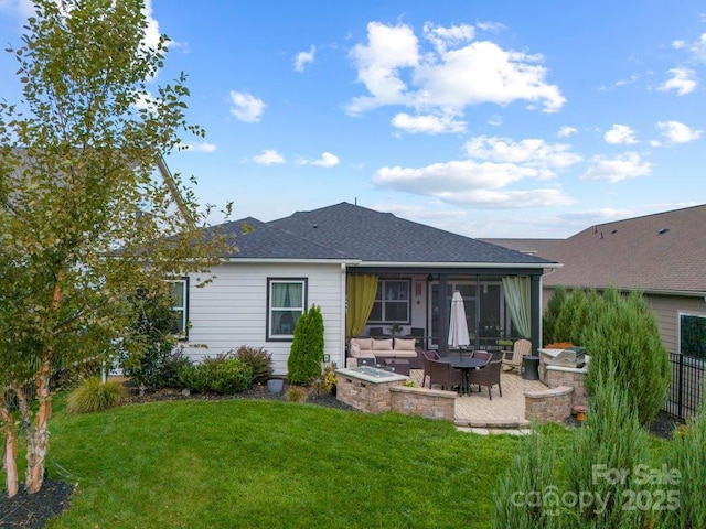 back of property with a lawn, an outdoor living space, and a patio