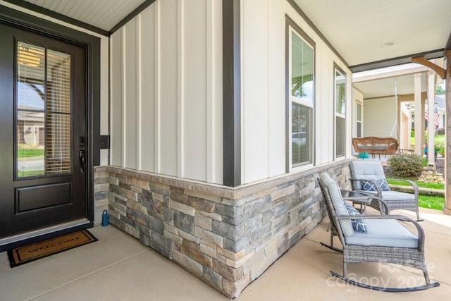 entrance to property with a porch