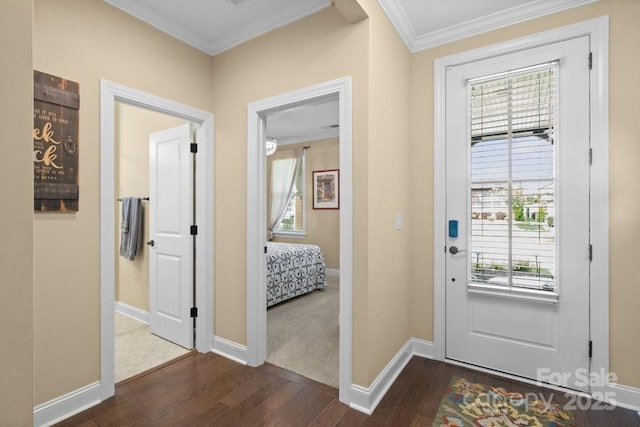 doorway to outside with crown molding and dark wood-type flooring