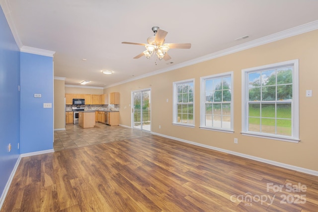 unfurnished living room with ceiling fan, crown molding, and dark hardwood / wood-style flooring