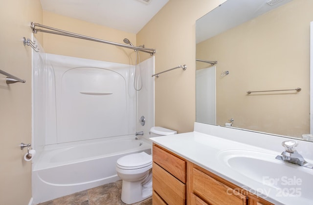 full bathroom with bathing tub / shower combination, toilet, and vanity