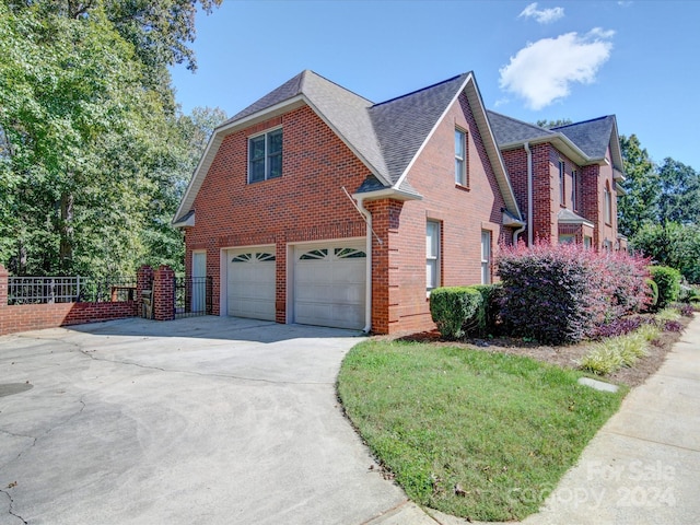 view of property exterior featuring a garage