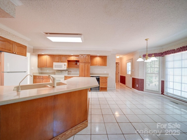 kitchen with wine cooler, hanging light fixtures, white appliances, and crown molding