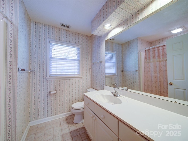 bathroom featuring vanity, tile patterned floors, toilet, and a shower with shower curtain