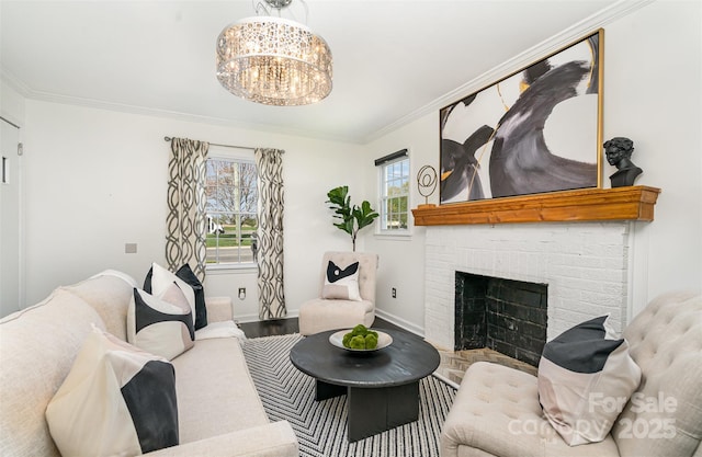630 S Myrtle School Rd, Gastonia, NC 28052 - living area featuring baseboards, ornamental molding, a notable chandelier, and plenty of natural light