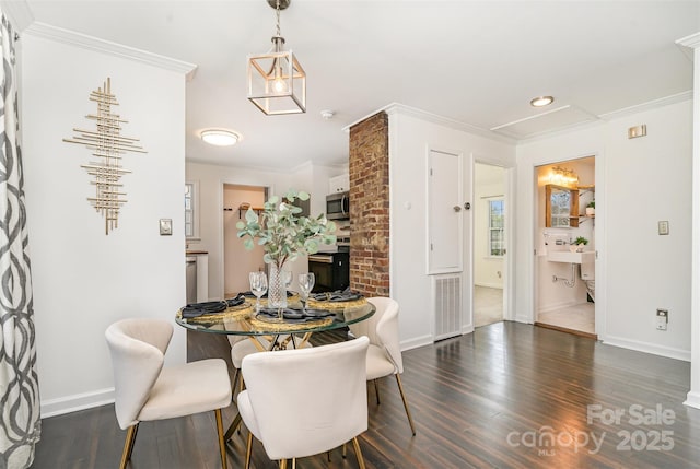 630 S Myrtle School Rd, Gastonia, NC 28052 - dining area featuring baseboards, visible vents, ornamental molding, and dark wood-style floors