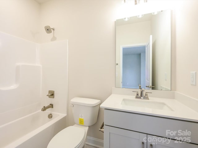 full bath with toilet,  shower combination, and vanity