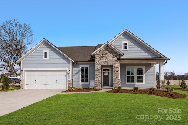 craftsman-style house featuring concrete driveway, a garage, stone siding, and a front lawn