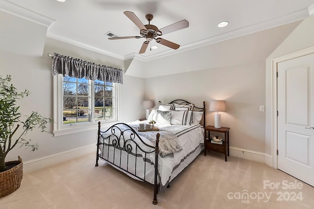 bedroom with ornamental molding, ceiling fan, and carpet flooring