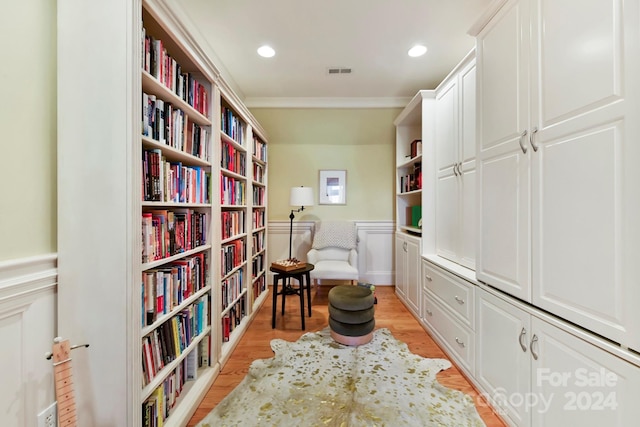 sitting room featuring light wood-type flooring