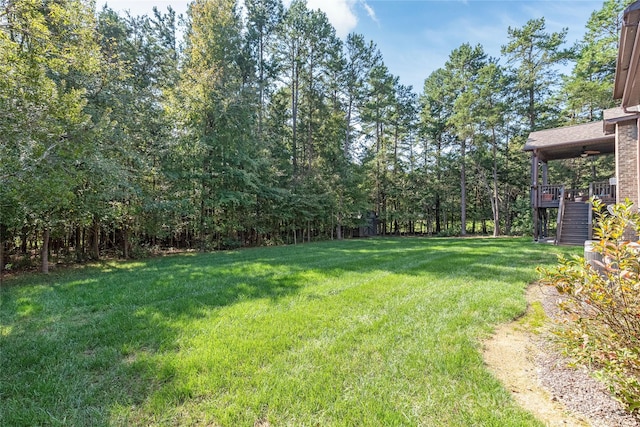 view of yard featuring a deck