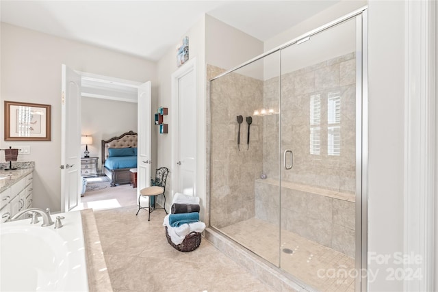 bathroom with an enclosed shower and vanity