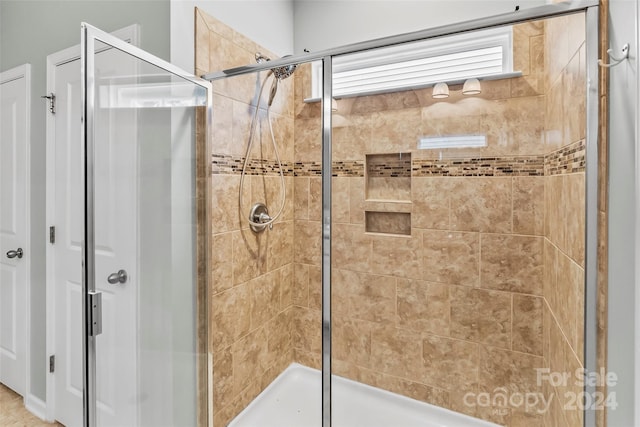 bathroom featuring walk in shower