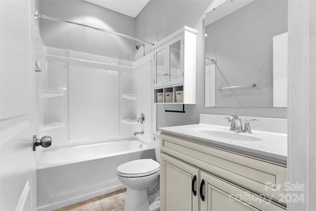 full bathroom with tile patterned floors, vanity, shower / bathtub combination, and toilet