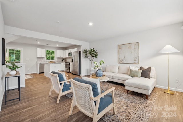 living room with hardwood / wood-style floors