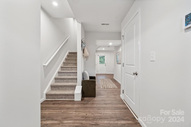 foyer featuring dark hardwood / wood-style floors