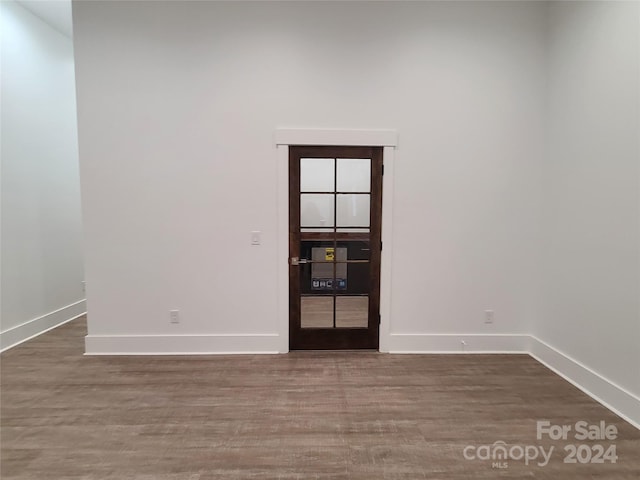 spare room featuring hardwood / wood-style floors