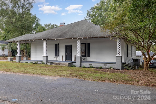 view of front of home featuring covered porch