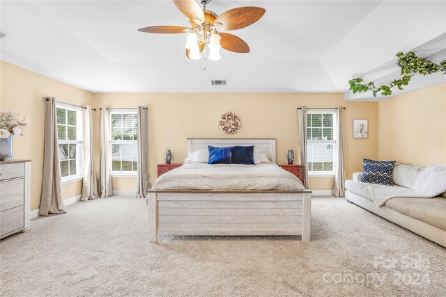 carpeted bedroom featuring ceiling fan