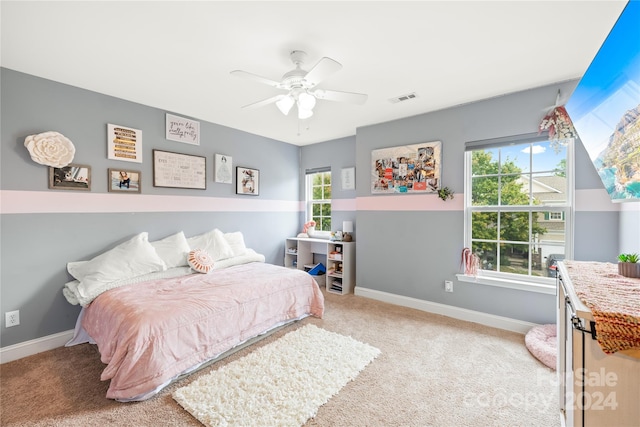 carpeted bedroom with ceiling fan