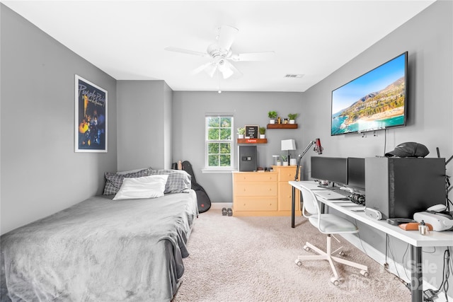 carpeted bedroom with ceiling fan