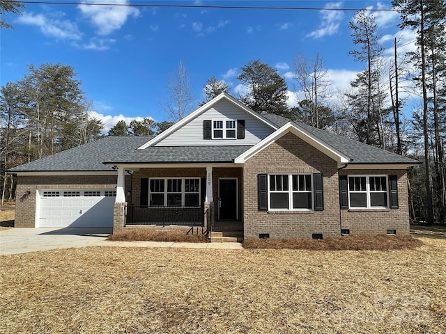 view of front of home with a garage and covered porch