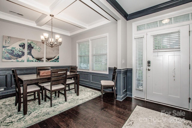 entryway with beamed ceiling, dark hardwood / wood-style floors, a notable chandelier, coffered ceiling, and crown molding