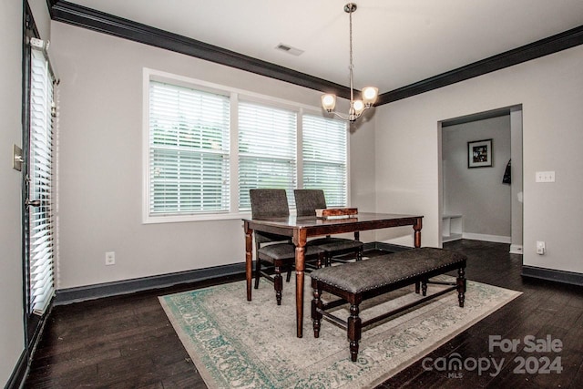 dining room featuring ornamental molding, a notable chandelier, and dark wood-type flooring