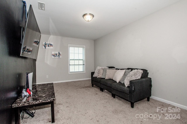 living room featuring light colored carpet