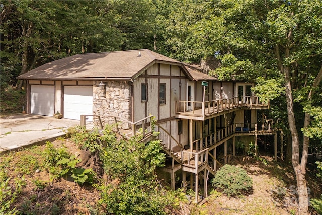120 Pinewood Cir, Laurel Park, NC 28739 - exterior space featuring a deck, stairs, a shingled roof, and stone siding