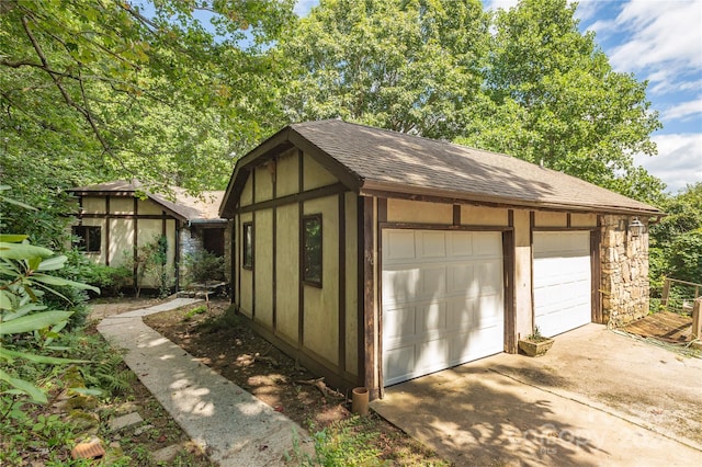 view of outbuilding featuring a garage