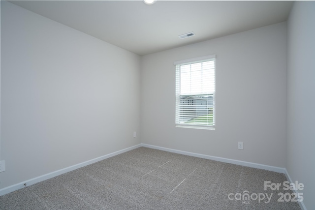 view of carpeted spare room