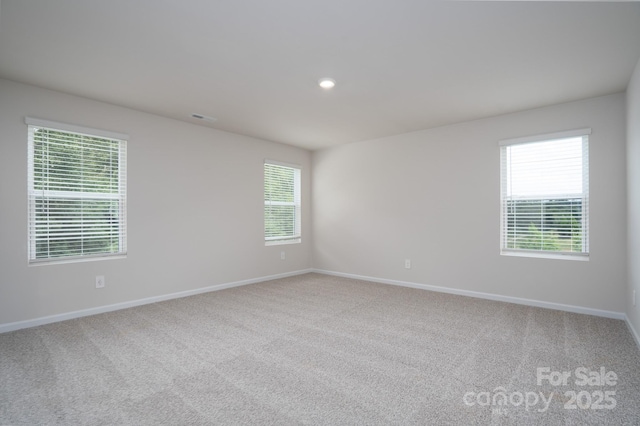 view of carpeted spare room