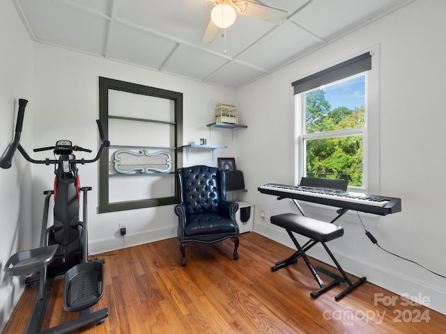 interior space with hardwood / wood-style floors and ceiling fan